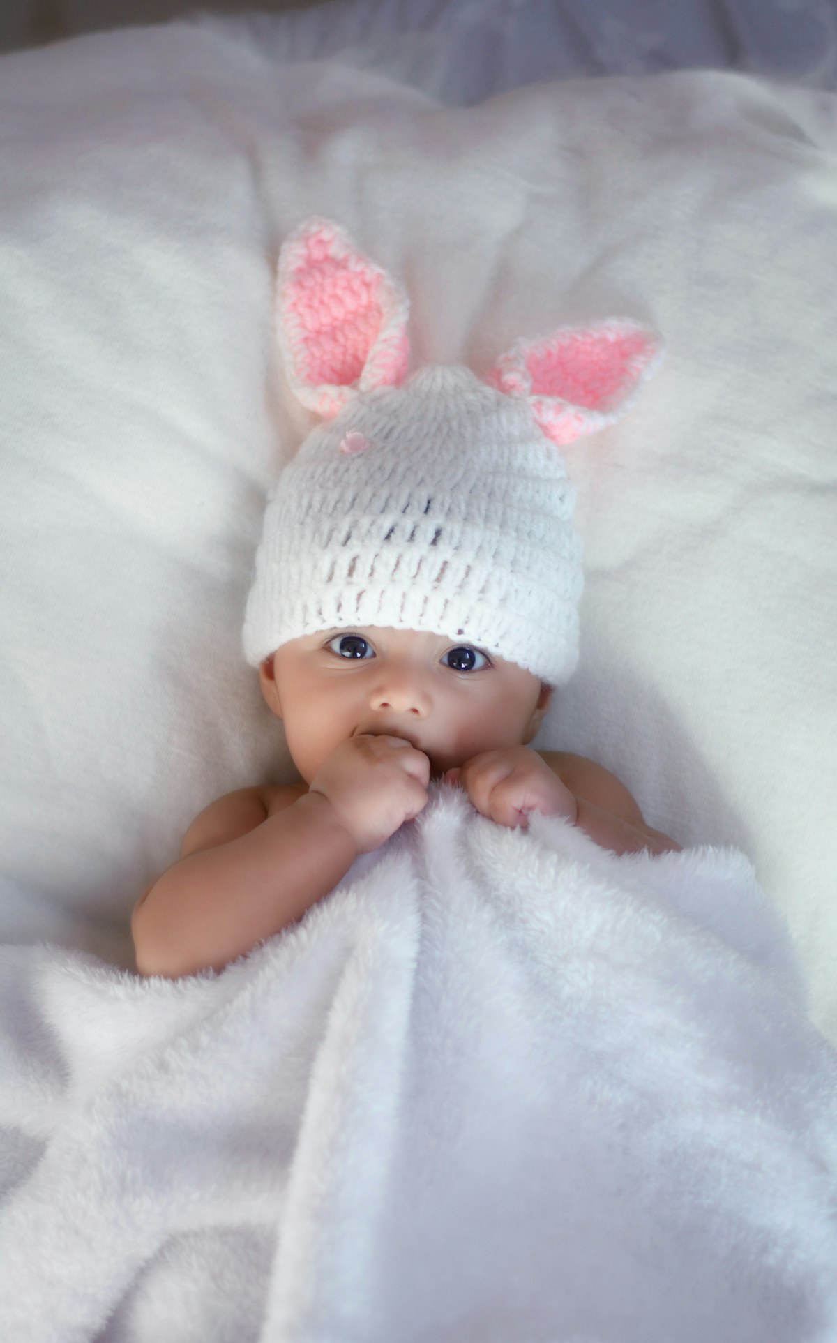 Sleeping newborn wrapped in a blanket